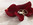 Rote Hochzeitsschuhe mit weißen Rosen